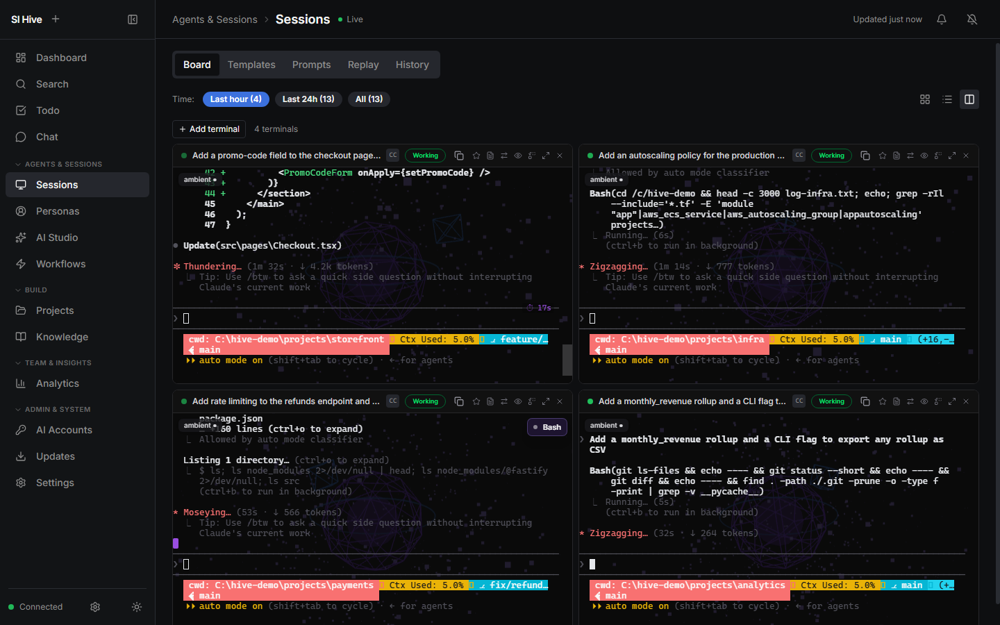 SI Hive terminal grid with four Claude Code agents working on different projects